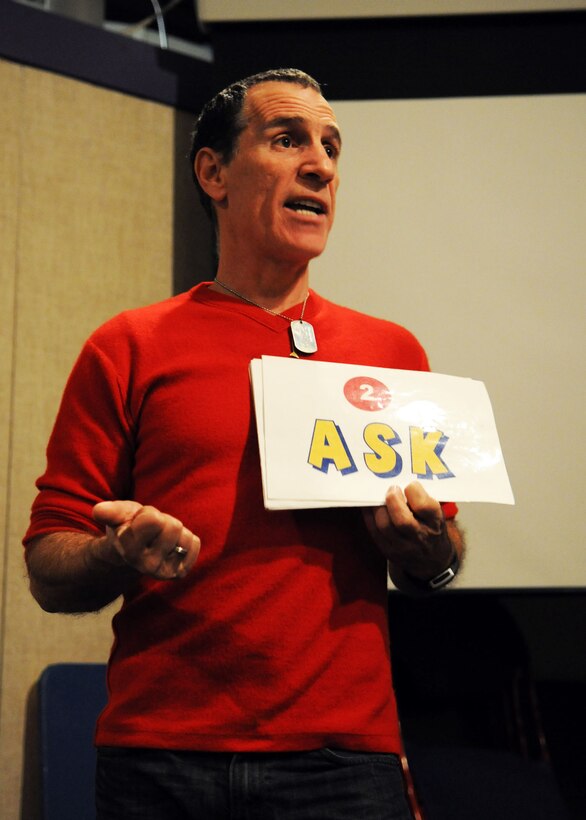 Trevor Romain, award-winning author, illustrator and presenter, holds a training session for the Youth Center staff on Joint Base Andrews, Md., March 25 as part of the 2014 “With You All The Way” Tour. The Trevor Romain Group and the United Services Organizations (USO) promote resiliency for children. (U.S. Air Force photo by Aimee Fujikawa)