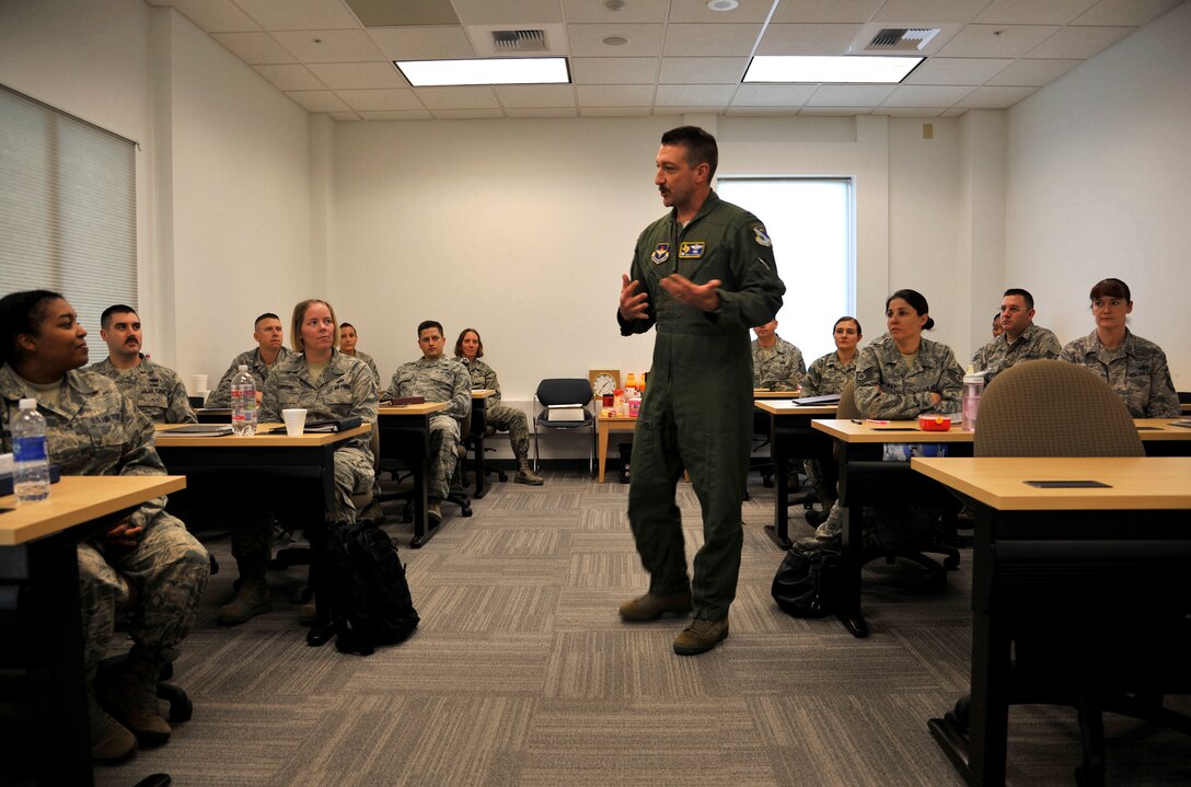 Col. Brian Hastings, 47th Flying Training Wing commander, speaks with students of the First Sergeant Additional Duty Course at the Student Activities Center on Laughlin Air Force Base, March 20, 2014. The course graduated 10 specially selected and qualified Airmen to take on the role of first sergeant as an additional duty, allowing them to fill in as unit first sergeant’s when called upon. (U.S. Air Force photo/Staff Sgt. Steven R. Doty/Released)