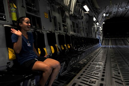Professional tennis player Lauren Davis, tours a C-17A Globemaster III, April 1, 2014, during a morale tour of Joint Base Charleston, S.C. Davis is a competitor in the Family Circle Cup tennis tournament on Daniel Island, S.C. (U.S. Air Force photo/Staff Sgt. Renae Pittman)