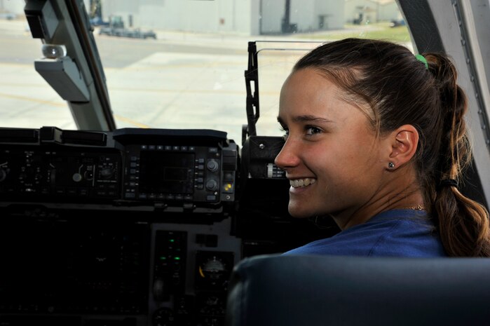 Senior Airman Cory Brashear, 14th Airlift Squadron loadmaster, and Capt. Thomas Carr, 14th AS pilot, give professional tennis player Lauren Davis, a briefing on the C-17A Globemaster III, April 1, 2014, at Joint Base Charleston, S.C. Lauren is a competitor in the Family Circle Cup tennis tournament on Daniel Island, S.C. (U.S. Air Force photo/Staff Sgt. Renae Pittman)