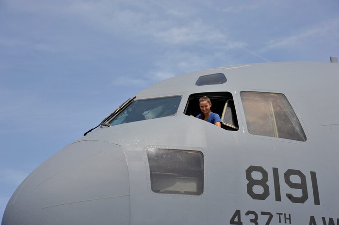 Professional tennis player Lauren Davis, tours a C-17A Globemaster III, April 1, 2014, during a morale tour of Joint Base Charleston, S.C. Lauren is a competitor in the Family Circle Cup tennis tournament on Daniel Island, S.C. (U.S. Air Force photo/Staff Sgt. Renae Pittman)