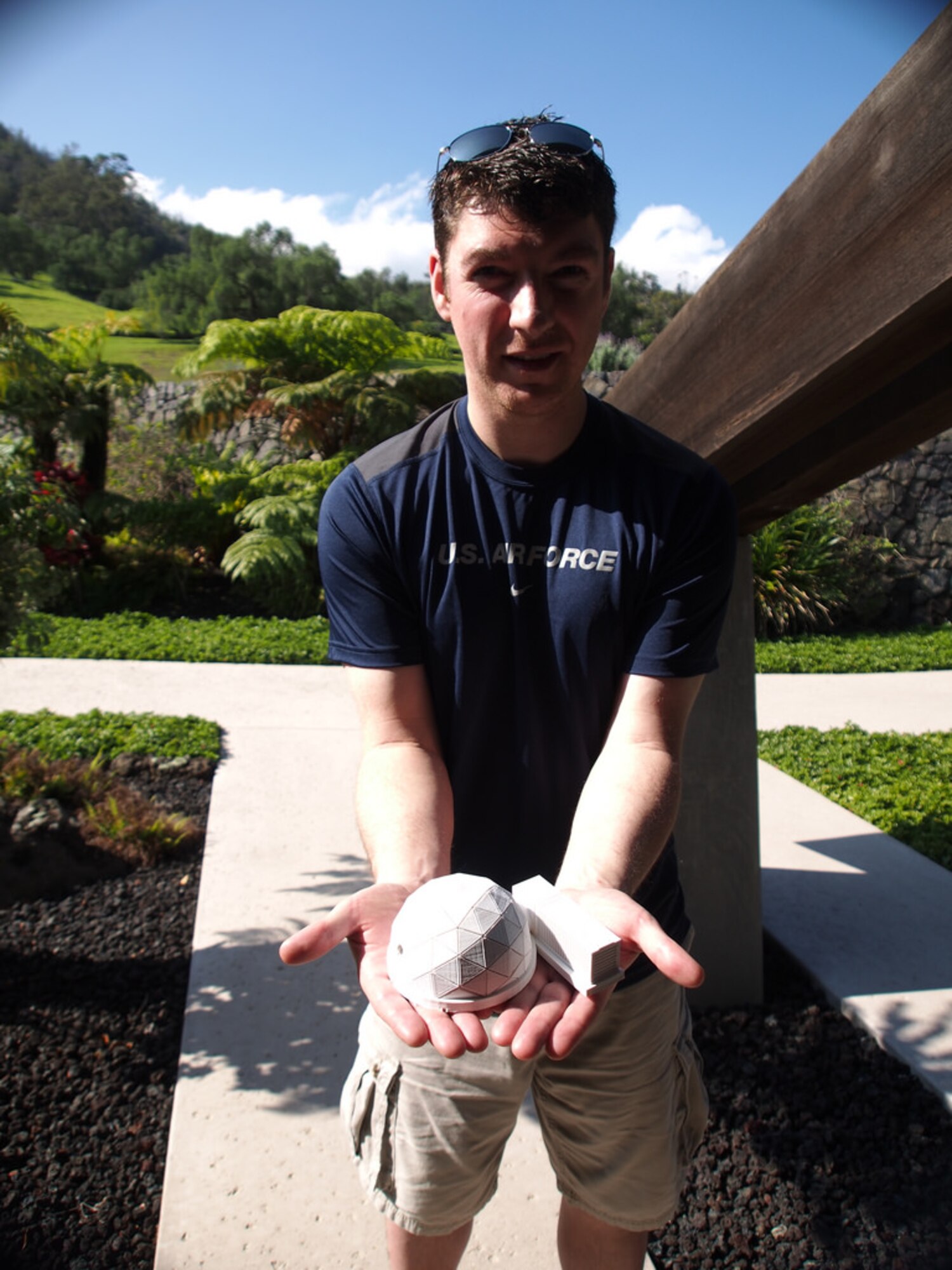 U.S. Air Force Reserve Capt. Casey Stedman, a navigator with the 773rd Airlift Squadron, holds a 3D-printed model of the Hawai'i Space Exploration Analog and Simulation (HI-SEAS) habitat. Stedman was selected as the mission commander for the second HI-SEAS mission, during which he will spend four months in a geodesic dome, beginning March 28, 2014. The mission is designed to simulate a long-term manned mission to Mars. Stedman is part of a six-person team. (Courtesy photo/Mr. Ross Lockwood, HI-SEAS).