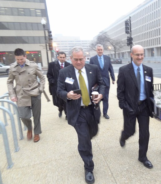 Members of the Arnold Community Council walk through the snow and rain to Tennessee Tuesday, an event hosted by Tennessee Senators Lamar Alexander and Bob Corker. Front row, left: Mike Niederhauser, ACC chairman of the Legislative Affairs Committee and Mark Brandon, (ATA) ACC member; back row, left: Carter Sain, president of the Manchester Chamber of Commerce; Bruce Shaw, (Cohesion Force) ACC chairman of the Community Relations/Public Service Committee and Lynn Sebourn (Dynetics), Tullahoma Area Economic Development Corporation.