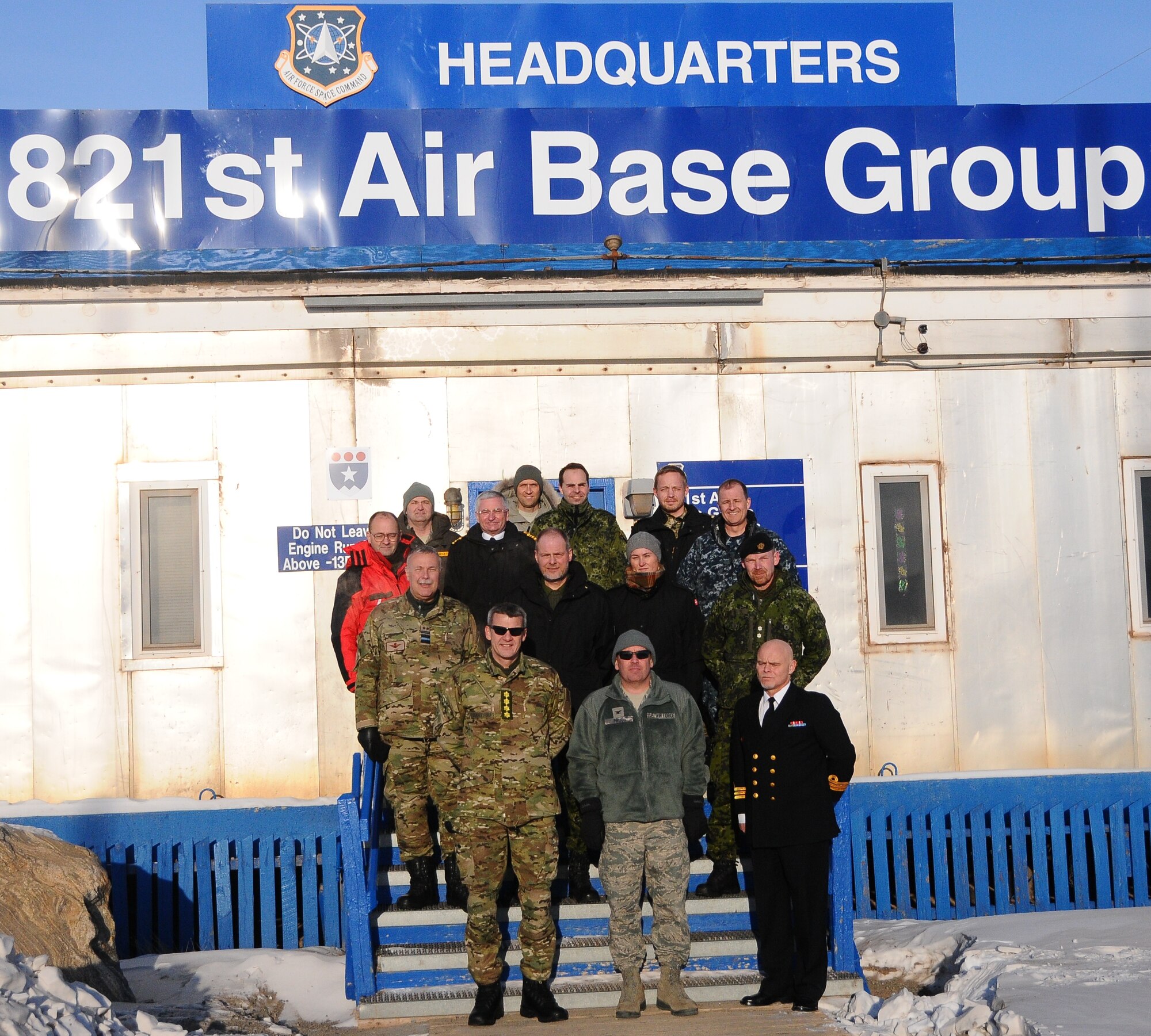 THULE AIR BASE, Greenland – Gen. Peter Bartram (front row left), Danish chief of Defense, visited the 821st Air Base Group March 25. While there, Bartram received a mission brief from Col. Joseph Prue (front row center), 821st ABG commander, as well as an educational tour of the base. (U.S. Air Force photo)