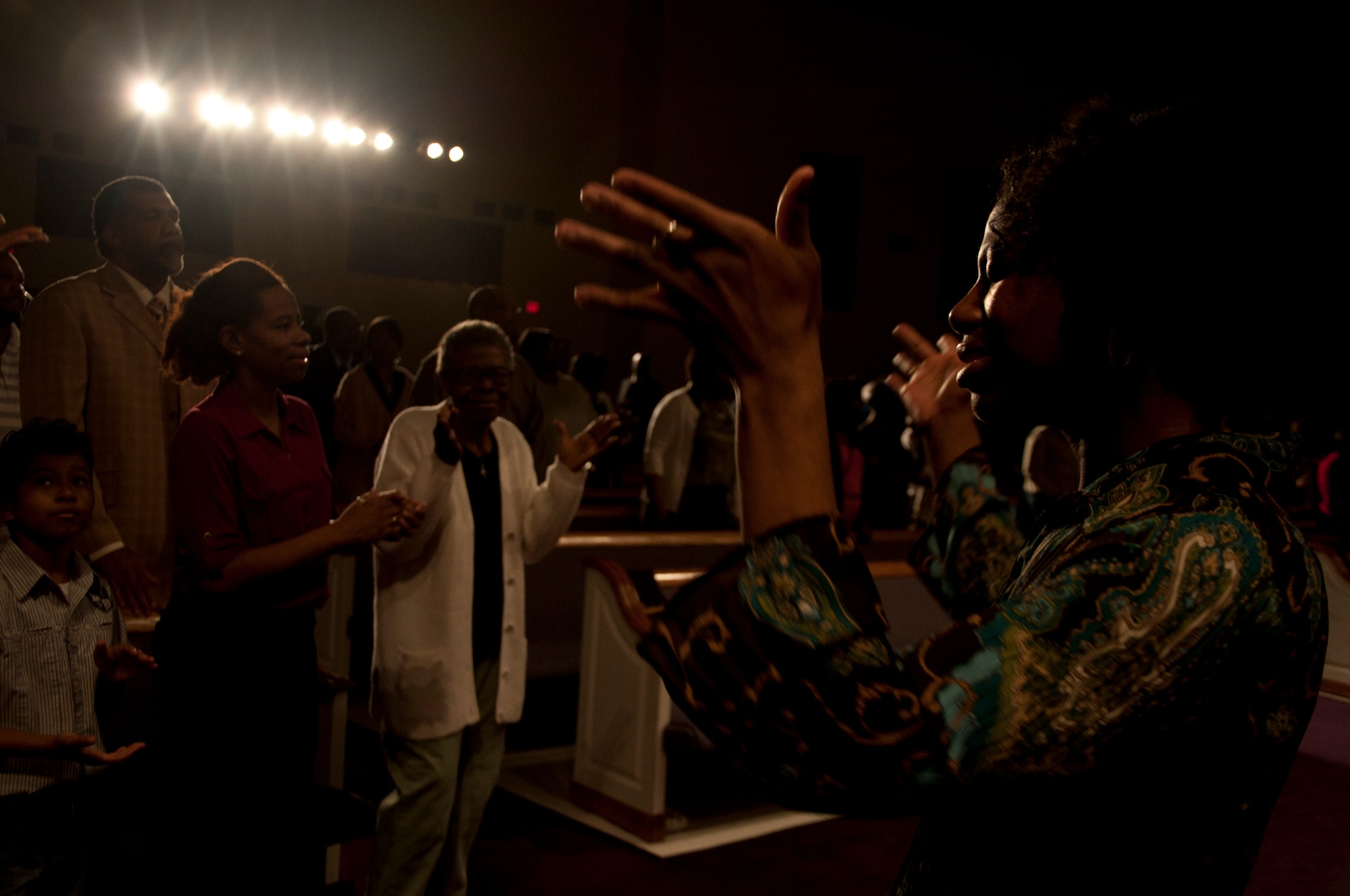 Airman 1st Class Shaney Scott interprets and teachers American Sign Language to a group at her church during service, March 23, 2014, in Montgomery, Ala. Scott is a 690th Network Support Squadron enterprise service desk technician at Maxwell Air Force Base’s Gunter Annex. She began using sign language to speak to her deaf brother at age 7. (U.S. Air Force photo by Staff Sgt. Natasha Stannard)