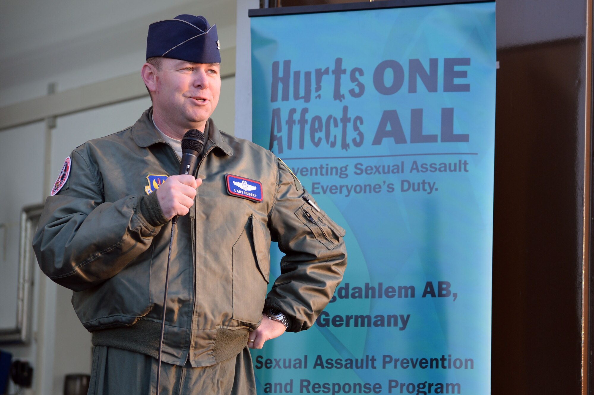 U.S. Air Force Col. Lars Hubert, 52nd Fighter Wing vice commander, makes opening remarks before a wing-wide 5K fun run for Sexual Assault Awareness Month at Spangdahlem Air Base, Germany, April 2, 2014. More than 100 runners attended the race. (U.S. Air Force photo by Senior Airman Alexis Siekert/Released)
