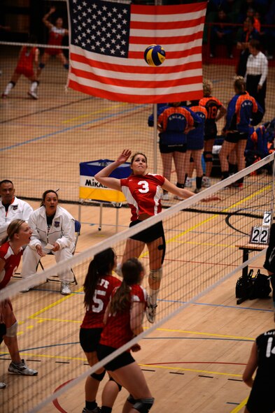 Caroline Kurtz, U.S. Air Forces in Europe and Air Forces Africa women’s volleyball team outside hitter from Albuquerque, N.M., goes up to spike a volleyball during a Headquarters Allied Air Command Inter-Nation Sports Programme Volleyball Championship tournament in Amsterdam, March 25, 2014. Kurtz went on to receive the MVP award for all competing women’s teams throughout the tournament. (U.S. Air Force photo by Senior Airman Gustavo Castillo/Released)