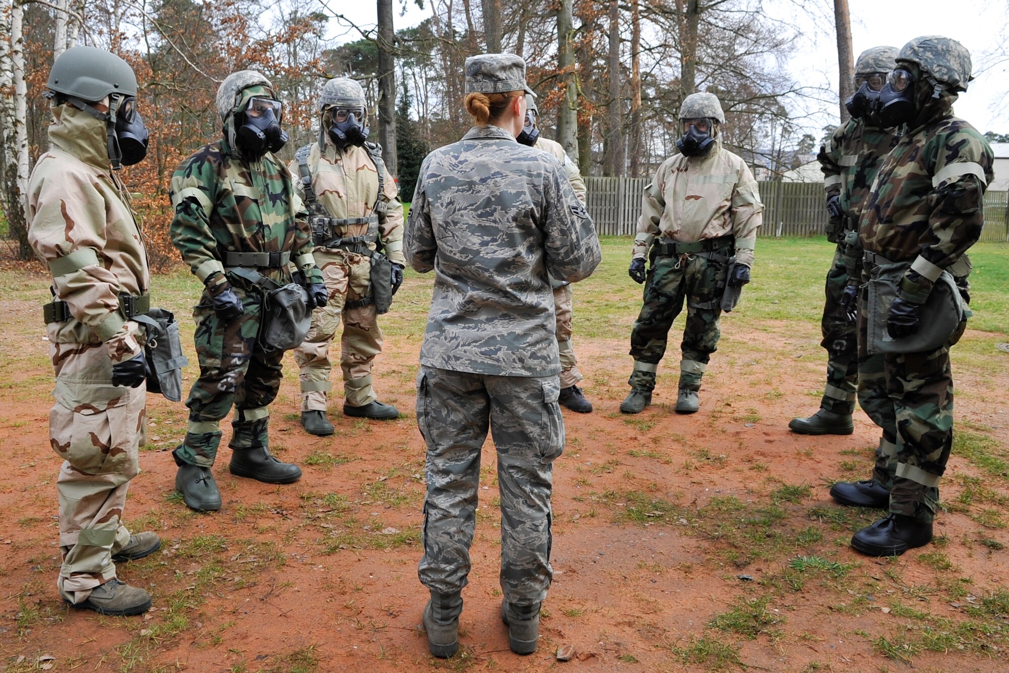 Airman 1st Class Bonnie Brooks, 786th Civil Engineering Squadron emergency management journeyman, instructs a chemical, biological, radiological and nuclear class March 3, 2014 at Ramstein Air Base, Germany. Brooks trains Airmen how to properly wear their mission oriented protective posture gear and simulate a post-attack reconnaissance sweep. (U.S. Air Force photo/Airman Larissa Greatwood)