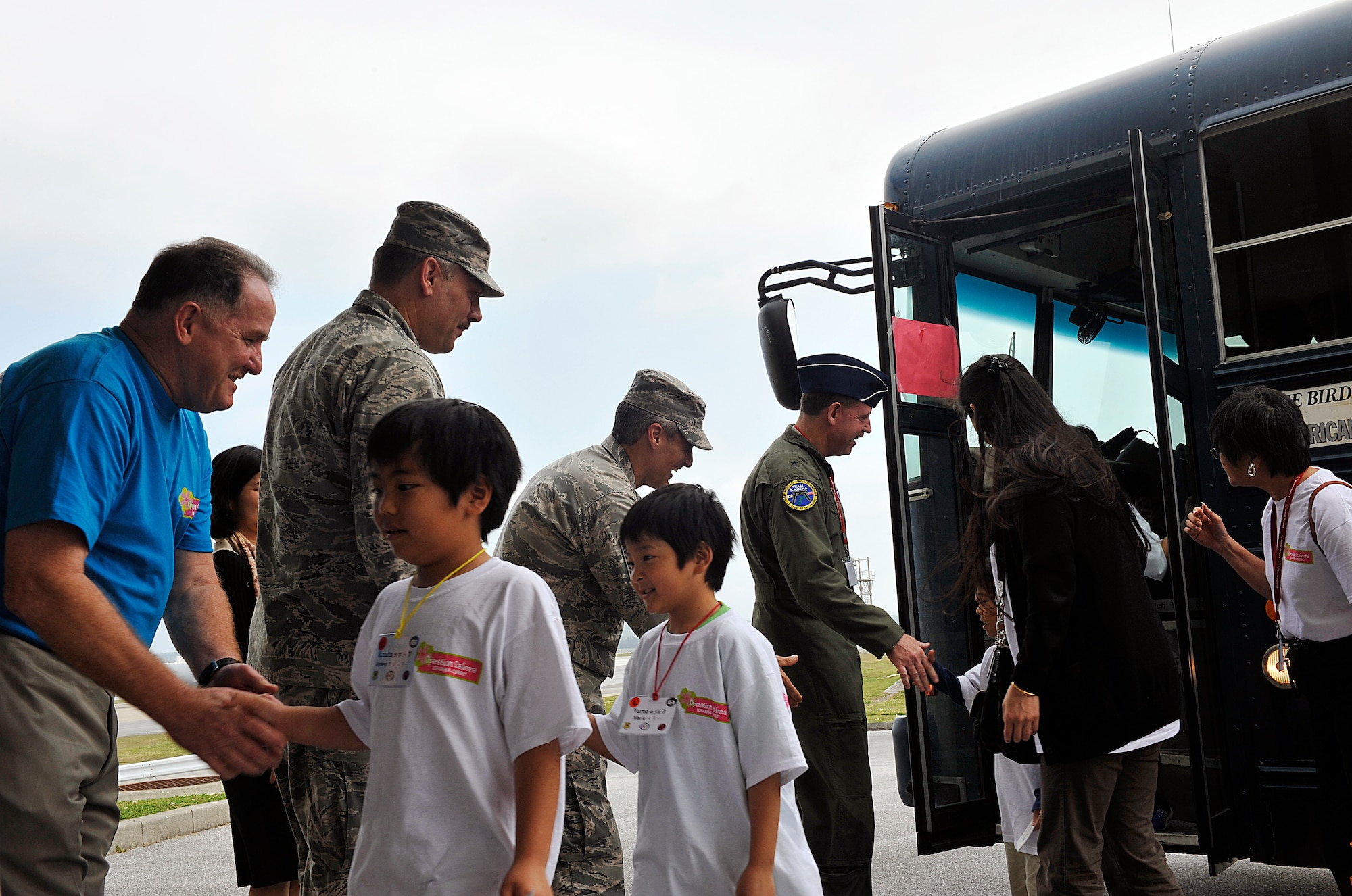 Team Kadena's leaders welcome children from Okinawan foster homes during Operation Sakura March on Kadena Air Base, Japan, March 28, 2014. Approximately 100 children from several Okinawan orphanages visited Kadena and had an opportunity to learn about the mission, see different demonstrations, get a closer look at Kadena's aircraft and interact with American children their age. (U.S. Air Force photo by Naoto Anazawa)