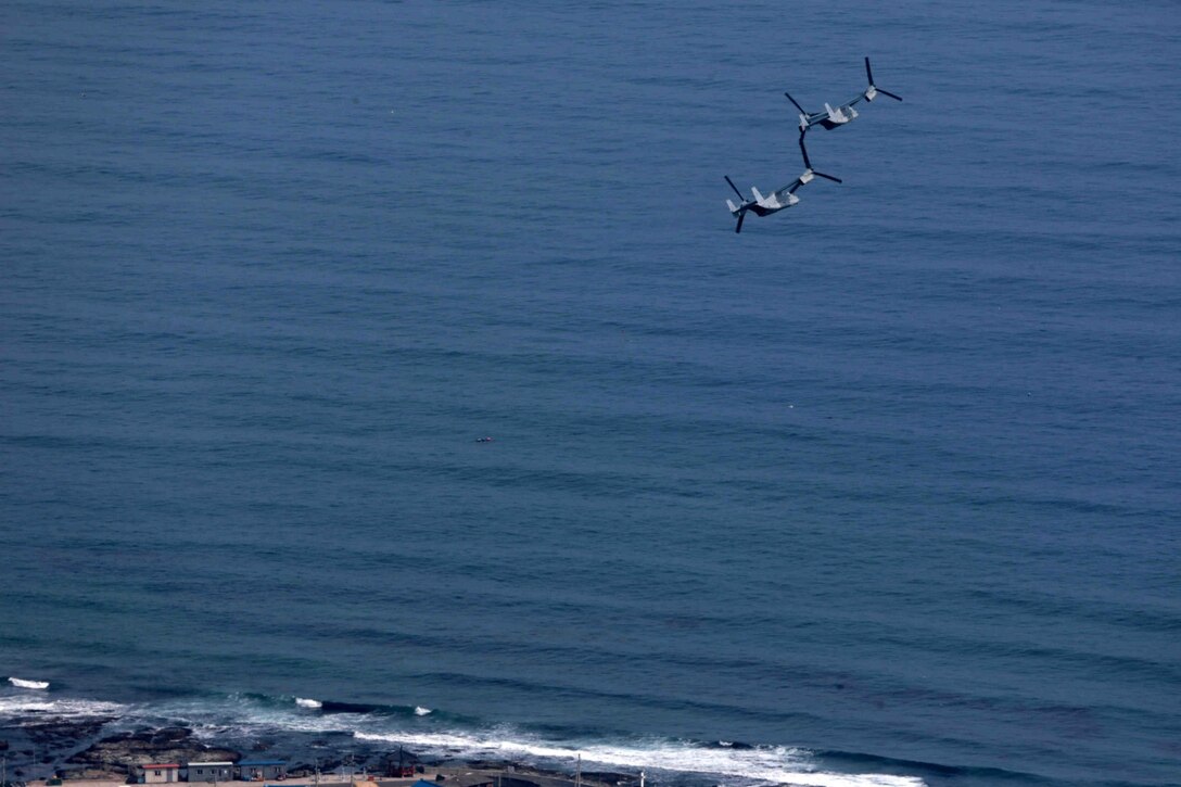 U.S. Marine Corps MV-22B Ospreys fly over the beach following an amphibious assault during Ssang Yong 14 at Doksu-Ri, Pohang, South Korea, March 31, 2014. Exercise Ssang Yong is conducted annually in the Republic of Korea (ROK) to enhance the interoperability of U.S. and ROK forces by performing a full spectrum of amphibious operations while showcasing sea-based power projection in the Pacific. (Official U.S. Marine Corps photo by Cpl. David Gonzalez/Released)