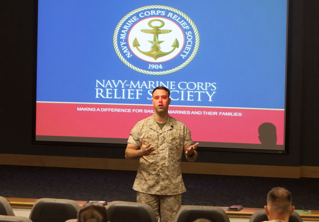 Gunnery Sgt. Michael Nastasi, the communications chief and Navy and Marine Corps Relief Society (NMCRS) active duty fund drive coordinator for Marine Special Operations Support Group speaks to a crowd of Marines, sailors and civilians of the MARSOC headquarters, explaining to them the many benefits of contributing to the NMCRS.  “Many moons ago when I was a PFC stationed in Okinawa, my grandfather had passed away.  At that time I couldn’t afford the $1,800 plane ticket from Naha to the U.S., explained Nastasi.   “The NMCRS stepped in when I really needed them the most, and helped me pay for the ticket.  To this day I am grateful for their service and the assistance they provided me.”  This year's drive will continue through April 15, and there is still time to donate.  Allotments are the preferable method of contributing; however, cash donations are also accepted. To find out more about the NMCRS or for additional information about the drive, contact Jesey McManus at (910) 451-5584.  Also, Maj. Kevin Kratzer, the 2014 NMCRS coordinator for MARSOC, can be reached at (910) 440-2733.