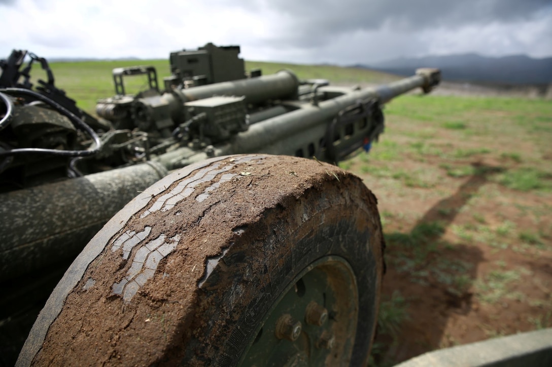 An M777A2 Howitzer sits quietly as Marines await their next fire mission. The M777A2 Howitzer is an asset to artillery units within the Marine Corps. It fires a variety of rounds exceeding 100lbs including white phosphorous, illumination and smoke rounds. The weapon system can be assembled and effectively engaging the enemy minutes after arriving on the battlefield. (U.S. Marine Corps photo by Lance Cpl. Jonathan Boynes/released)