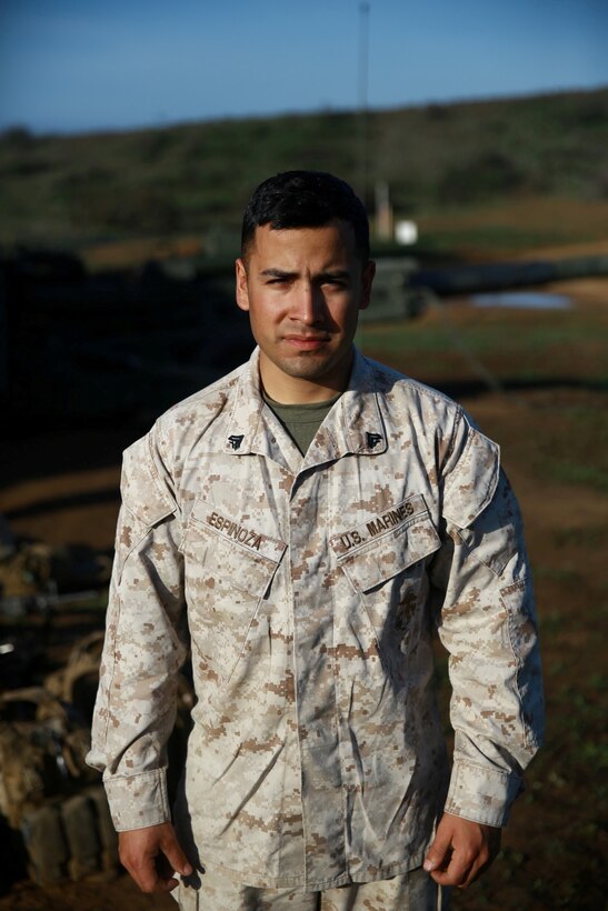Corporal Christopher Espinoza, an artillery section chief with India Battery, 1st Battalion, 11th Marine Regiment, leads and inspires his Marines on the firing line. He is responsible for the safety and success of the Marines operating the M777A2 Howitzer during firing exercises. Espinoza ensures that all of his Marines are well versed in their specific roles so rounds can be safely and quickly loaded and fired.  (U.S. Marine Corps photo by Lance Cpl. Jonathan Boynes/released)