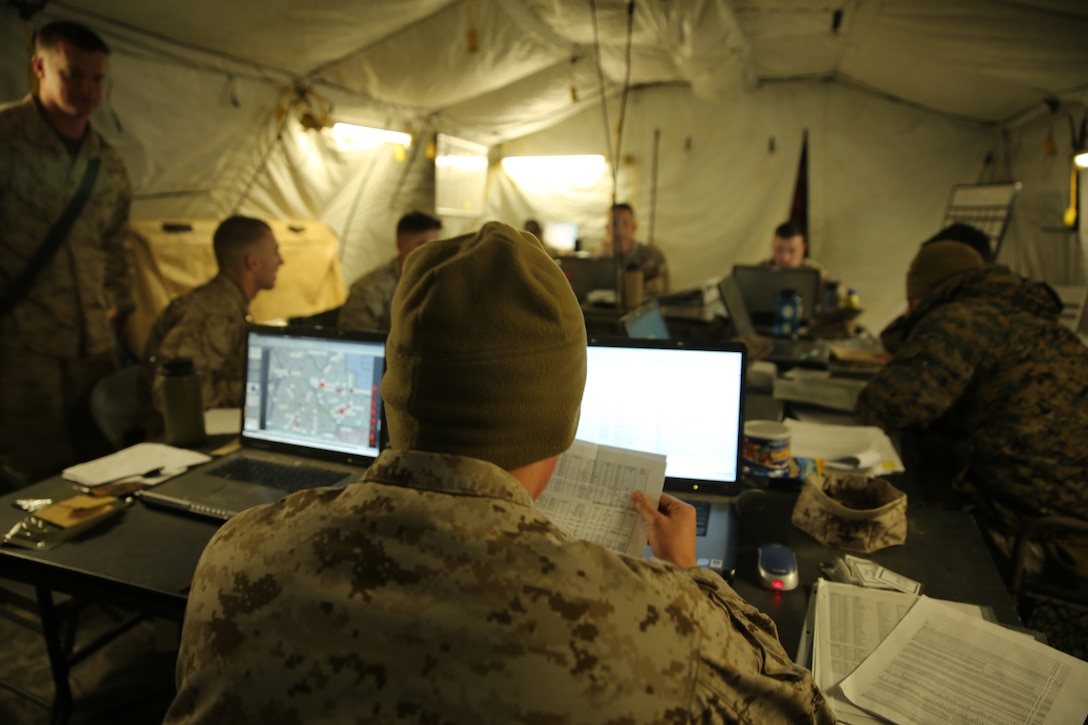 Students run the command and control center during the Logistics Officer Course Field Exercise in the Verona Training Loop aboard Marine Corps Base Camp Lejeune, March 26. The LOC field exercise is their final week of training and forces the students to work together to accomplish a multitude of tasks.