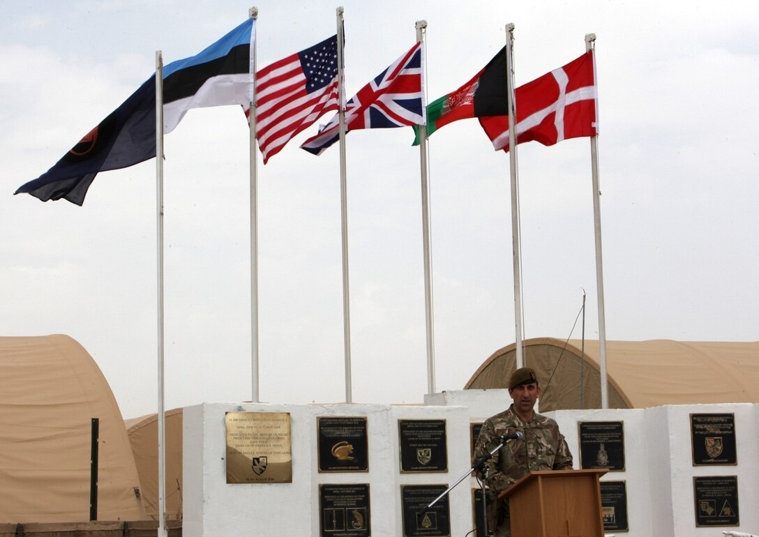 Brigadier James Woodham, commander of Task Force Helmand, gives his parting remarks as the final commander of TFH during the merger ceremony for the task force and Regional Command (Southwest) aboard Camp Bastion, Afghanistan, April 1, 2014. Following eight years of combat operations in Helmand province, the ceremony marked the end of the United Kingdom’s military headquarters in southwestern Afghanistan. The functions of the British headquarters element now reside with RC(SW). The task force was established in April 2006 and has conducted 16 rotations since its beginning.




