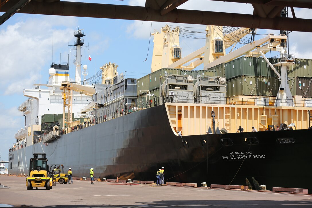 Members of the U.S. Navy organize and initiate the offloading of Marine Rotational Force – Darwin gear from the USNS 2nd Lt. John P. Bobo while members of the Marine Corps and Australian Defence Force begin transporting it to Robertson Barracks and Royal Australian Air Force’s Base Darwin, March 31. As of early April, MRF-D will be at full capacity, wasting no time to begin the six-month rotation alongside the ADF and Darwin community for the extent of the Dry Season.