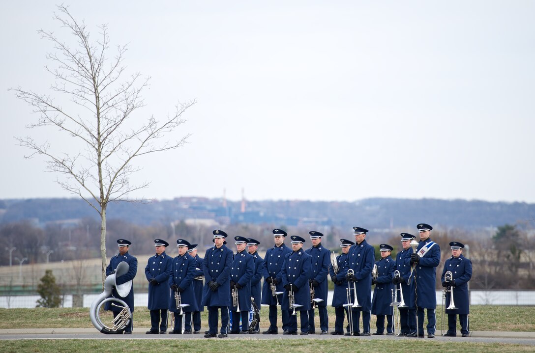 The Ceremonial Brass provides musical support as former member and beloved leader with The USAF Band, CMSgt Beth Schouten, is laid to rest at Arlington National Cemetery during a full honors ceremony.  (US Air Force photo by SMSgt Kevin Burns/released)
