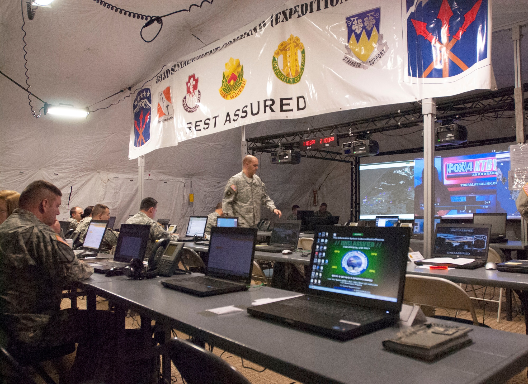 The Joint Forces Land Component Command is capable of communicating throughout the command through the use of an AN/TSC 156 Phoenix satellite, set up by the 59th Signal Battalion, during Alaska Shield 14 here April 2, 2014. The 59th Signal Battalion was tasked to reestablish communications after a black-out occurred for this exercise. Alaska Shield 14 is an exercise that involves federal, state, local and military agencies, designed to test response and coordination efforts during a disaster and is modeled after the 1964 earthquake and subsequent tsunami that devastated Alaska. (U.S. Army photo by Spc. True Thao)