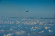 A B-52 Stratofortress is refueled in-flight April 2, 2014 over the Pacific Ocean near Joint Base Pearl Harbor-Hickam, Hawaii. This flight was in support of a mission in which two B-52 Stratofortress strategic bombers from Barksdale Air Force Base, La. and two B-2 Spirit strategic bombers from Whiteman Air Force Base, Mo., flew round trip non-stop from their respective home stations to training ranges in Hawaii. (U.S. Air Force photo by Staff Sgt. Nathan Allen)