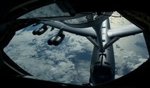 A B-52 Stratofortress is refueled in-flight April 2, 2014 over the Pacific Ocean near Joint Base Pearl Harbor-Hickam, Hawaii. This flight was in support of a mission in which two B-52 Stratofortress strategic bombers from Barksdale Air Force Base, La. and two B-2 Spirit strategic bombers from Whiteman Air Force Base, Mo., flew round trip non-stop from their respective home stations to training ranges in Hawaii. (U.S. Air Force photo by Staff Sgt. Nathan Allen)