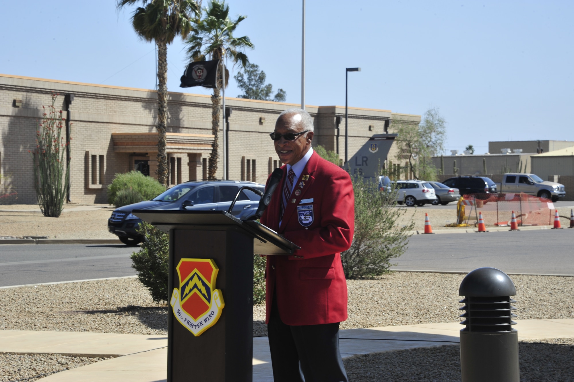 David Toliver, Archer-Ragsdale Arizona Chapter Tuskegee Airmen, Inc. president, speaks March 27 at the inaugural Tuskegee Airmen Commemoration Day ceremony at the Luke Air Force Base Tuskegee Airmen Memorial Air Park. The ceremony was the first of its kind after Gov. Janice Brewer signed legislation designating the fourth Thursday of March as a day to celebrate the men and women who shaped the first black military wing in the Army Air Corps. Toliver, along with four Tuskegee Airmen, their friends and family, Luke Thunderbolts and members of the local community attended the event. (U.S. Air Force photo/Senior Airman Grace Lee)