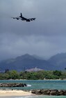 A B-52 Stratofortress strategic bomber conducts a low approach training flight over Joint Base Pearl Harbor-Hickam, Hawaii April 2, 2014.  Two B-52 Stratofortress strategic bombers from Barksdale Air Force Base, La. and two B-2 Spirit strategic bombers from Whiteman Air Force Base, Mo., flew non-stop from their respective home stations to training ranges within the vicinity of Hawaii and conducted range training operations and low approach training flights at Hickam AFB. (U.S. Marine Corps photographs by Staff Sgt. Jason W. Fudge)