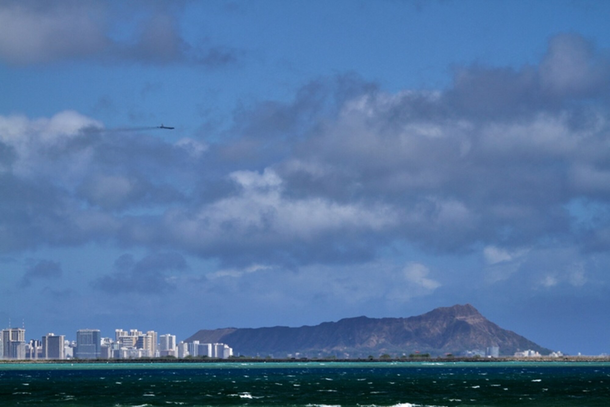 A B-52 Stratofortress strategic bomber conducts a low approach training flight over Joint Base Pearl Harbor-Hickam, Hawaii April 2, 2014.  Two B-52 Stratofortress strategic bombers from Barksdale Air Force Base, La. and two B-2 Spirit strategic bombers from Whiteman Air Force Base, Mo., flew non-stop from their respective home stations to training ranges within the vicinity of Hawaii and conducted range training operations and low approach training flights at Hickam AFB. (U.S. Marine Corps photographs by Staff Sgt. Jason W. Fudge)