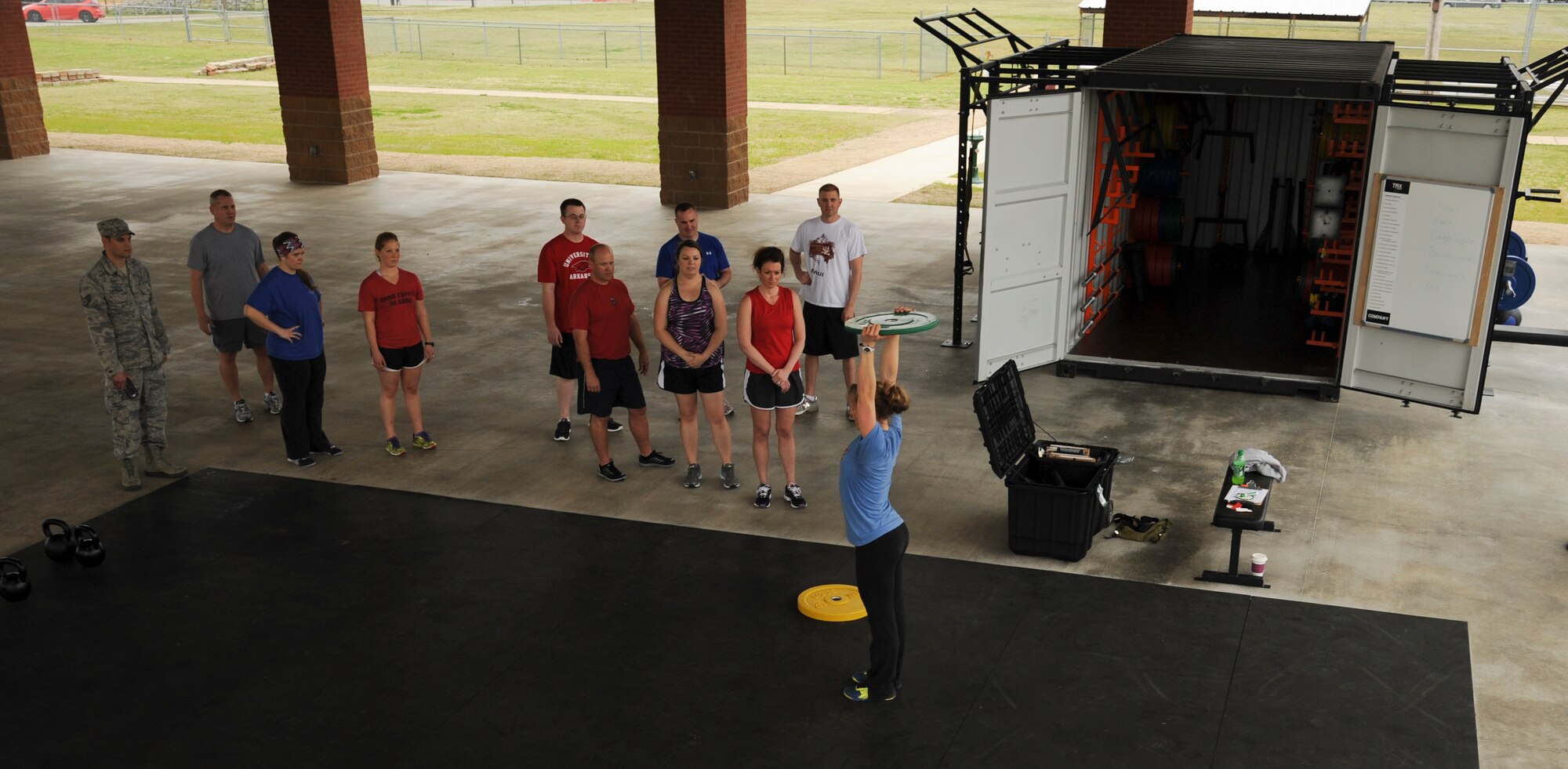 A group of Team Little Rock Airmen are taught a Vital 90 exercise class at the WarFit pavilion (Bldg. 792)  April 2, 2014, at Little Rock Air Force Base, Ark. The group was using new workout equipment that was recently setup to keep Airmen fit-to-fight. (U.S. Air Force photos by Airman 1st Class Harry Brexel)