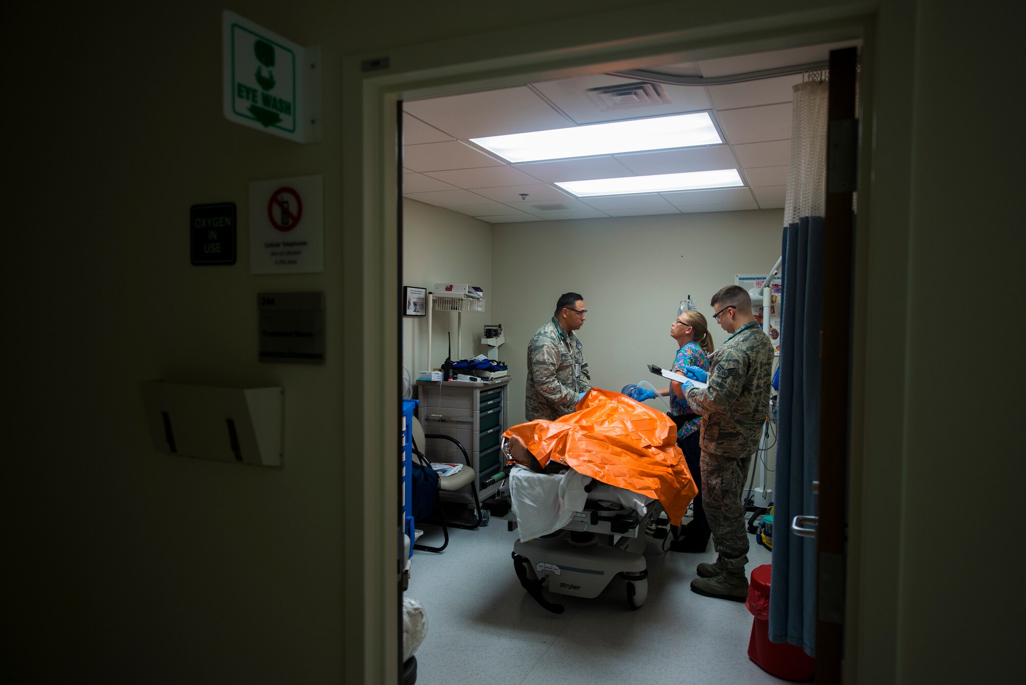 A patient receives treatment during a chemical, biological, radiological and nuclear major accident response exercise at Moody Air Force Base, Ga., April 3, 2014. The 23d Medical Group is usually part of the initial response team to any major accidents on base. (U.S. Air Force photo by Airman 1st Class Ryan Callaghan/Released)
