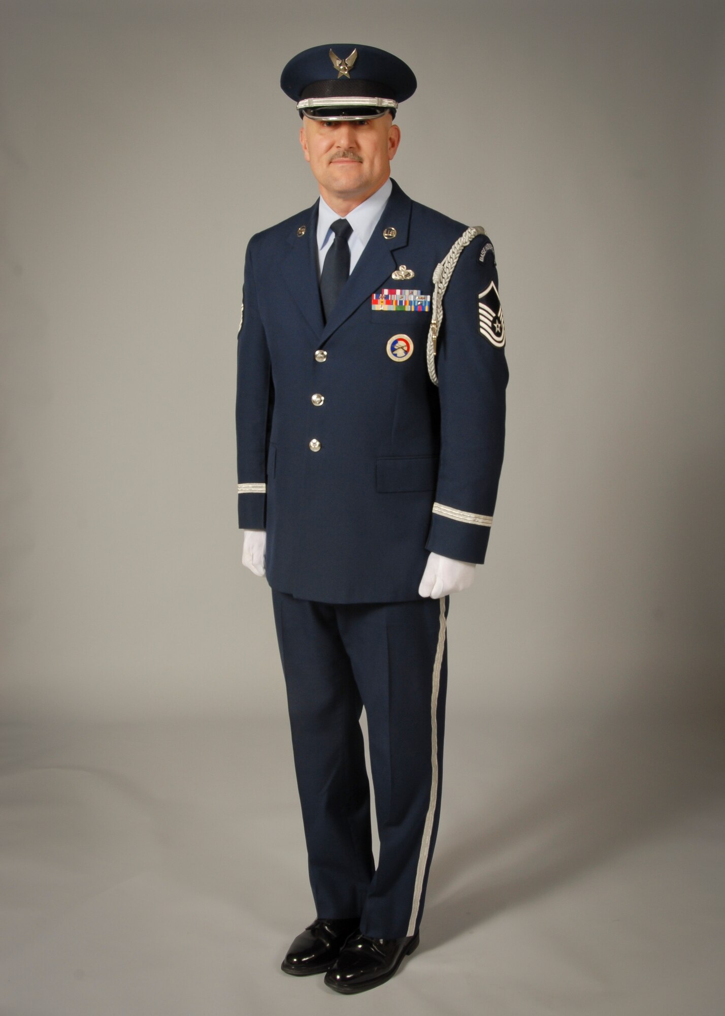 Master Sgt. David Coker poses for his official portrait in his honor guard uniform here Jan. 12, 2014.  (Air National Guard photo by Staff Sgt. Jenna Hildebrand/Released)