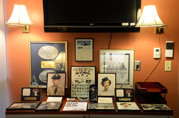 Col. Katherine Rearden, 59th Medical Wing Clinical Research Division chief, proudly displays her family’s Air Force heritage in her office on Joint Base San Antonio-Lackland, Texas March 28, 2014. Rearden’s parents and grandfather greatly inspired her with their values and dedication, leading her to follow in their footsteps and serve her country. (U.S. Air Force photo/Staff Sgt. Christopher Carwile)
