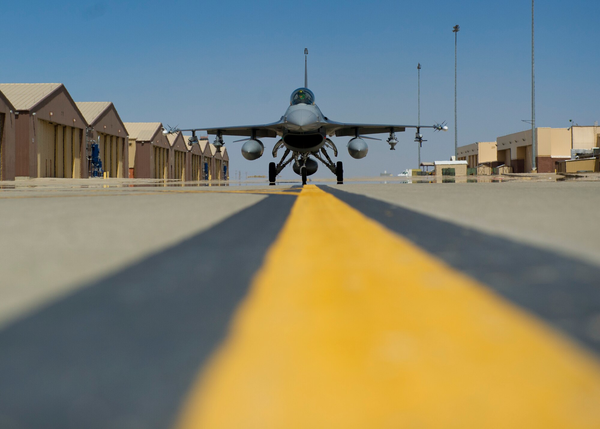 The 54th Fighter Group, a tenant unit of the 56th Fighter wing at Luke Air Force Base Ariz., received its first three-ship formation of F-16 Fighting Falcons at Holloman Air Force Base N.M., April 1. The 54th Fighter Group will ultimately operate two F-16 training squadrons at Holloman through the end of 2015. (U.S. Air Force photo by Airman 1st Class Chase Cannon/ Released)