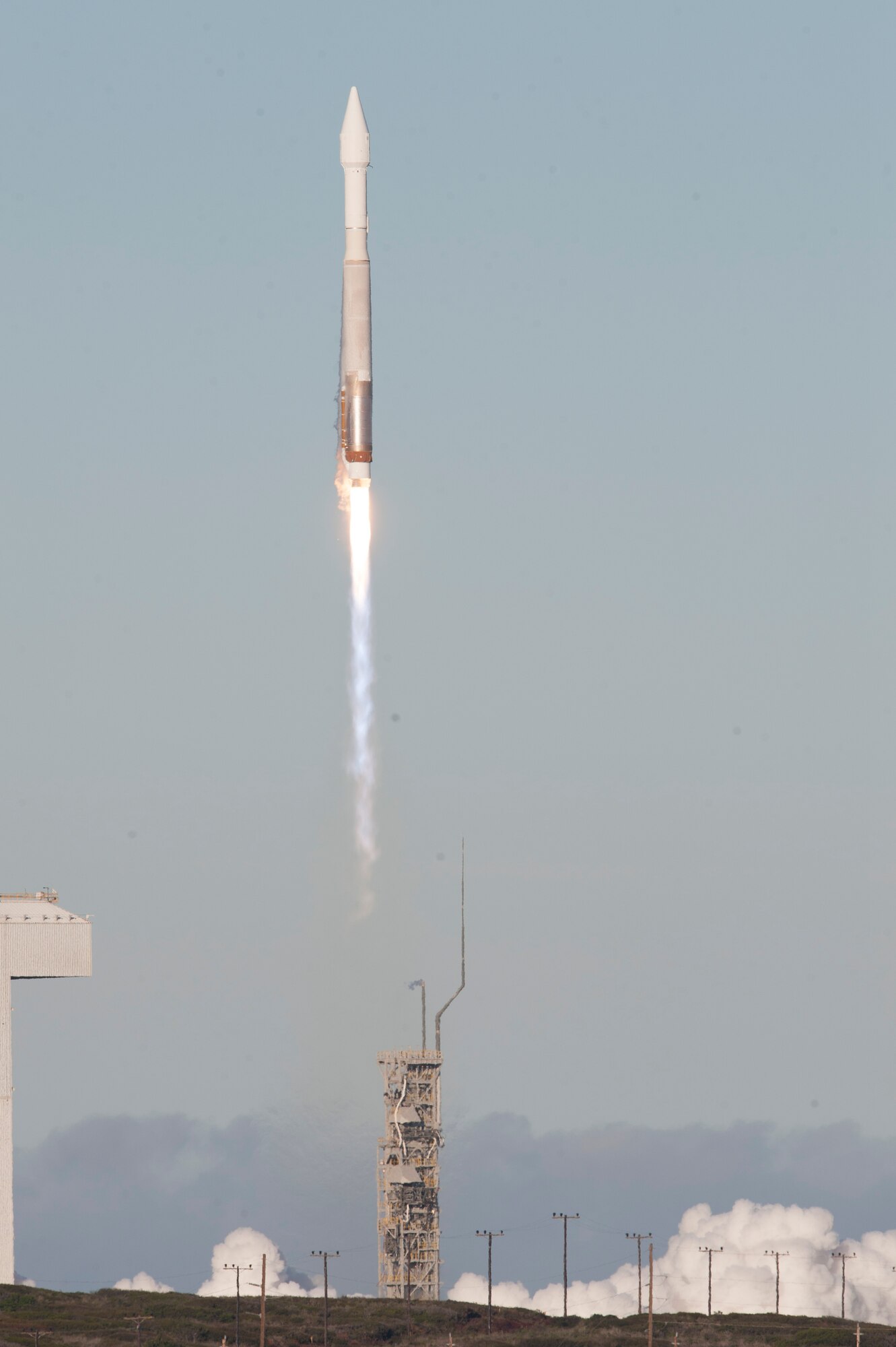 Team Vandenberg successfully launched the 19th U.S. Air Force Defense Meteorological Satellite Program payload on an Atlas V rocket from Space Launch Complex-3 at 7:46 a.m. PDT, April 3, 2014, Vandenberg Air Force Base, Calif. This year Vandenberg celebrates 55 years of space launch history. (U.S. Air Force photo by Tech. Sgt. Tyrona Lawson/Released)

