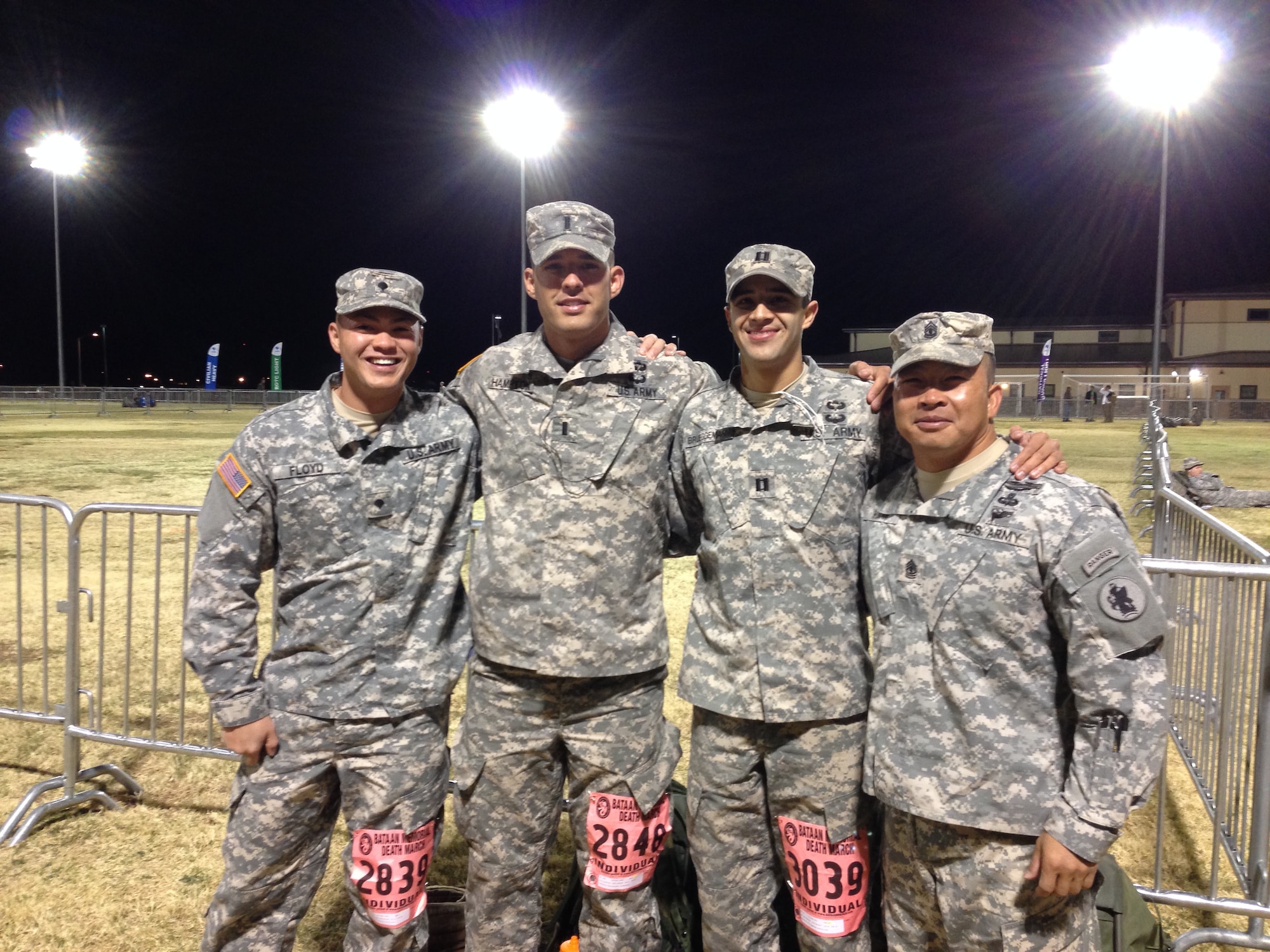 From left to right, U.S. Army Spc. Christopher Floyd,U.S. Army 1st Lt. Spencer Hampton, U.S. Army Capt. Bradley Brueggemann, U.S. Army 1st Sgt. Thinh Huynh at the Bataan Memorial Death March on Sunday March 23, 2014. Four members of Joint Task Force-Bravo’s Army Forces Battalion (ARFOR) in Soto Cano Air Base, Honduras, completed the Bataan Memorial Death March on Sunday March 23, 2014 in the White Sands Missile Range, New Mexico. The Bataan Memorial Death March honors a group of World War II heroes, who defended the islands of Luzon, Corregidor and the harbor defense forts of the Philippines in 1942. After being captured by the Japanese forces, these Army, Army Air Corps, Navy, Marines, and National Guard heroes, survived on half or quarter rations and outdated equipment during the 80 mile march.The soldiers were responsible for the defense of the islands of Luzon, Corregidor and the harbor defense forts of the Philippines.