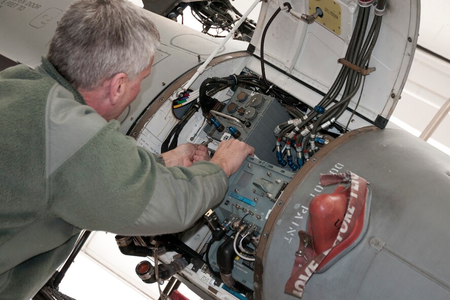 Senior Master Sgt. Dan Manning conducts avionics upgrades on an F-16 aircraft in the hangar of the 132nd Fighter Wing (132FW), Des Moines, Iowa on Sunday, March 2, 2014.  The 132FW has been selected to assist with this process, called a “Speed Line”, rather than sending the F-16s to Hill Air Force Base as previously done in the past; this saves approximately $100,000.00 per aircraft.  (U.S. Air National Guard photo by Staff Sgt. Linda K. Burger/Released)