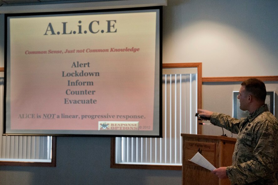1st Lt. AJ Christian teaches leadership of the 132nd Fighter Wing (132FW) how to react and respond in the event of an active shooter during A.L.I.C.E. training held in the Wing Classroom of the 132FW, Des Moines, Iowa on Sunday, February 9, 2014.  (U.S. Air National Guard photo by Staff Sgt. Linda K. Burger/Released)