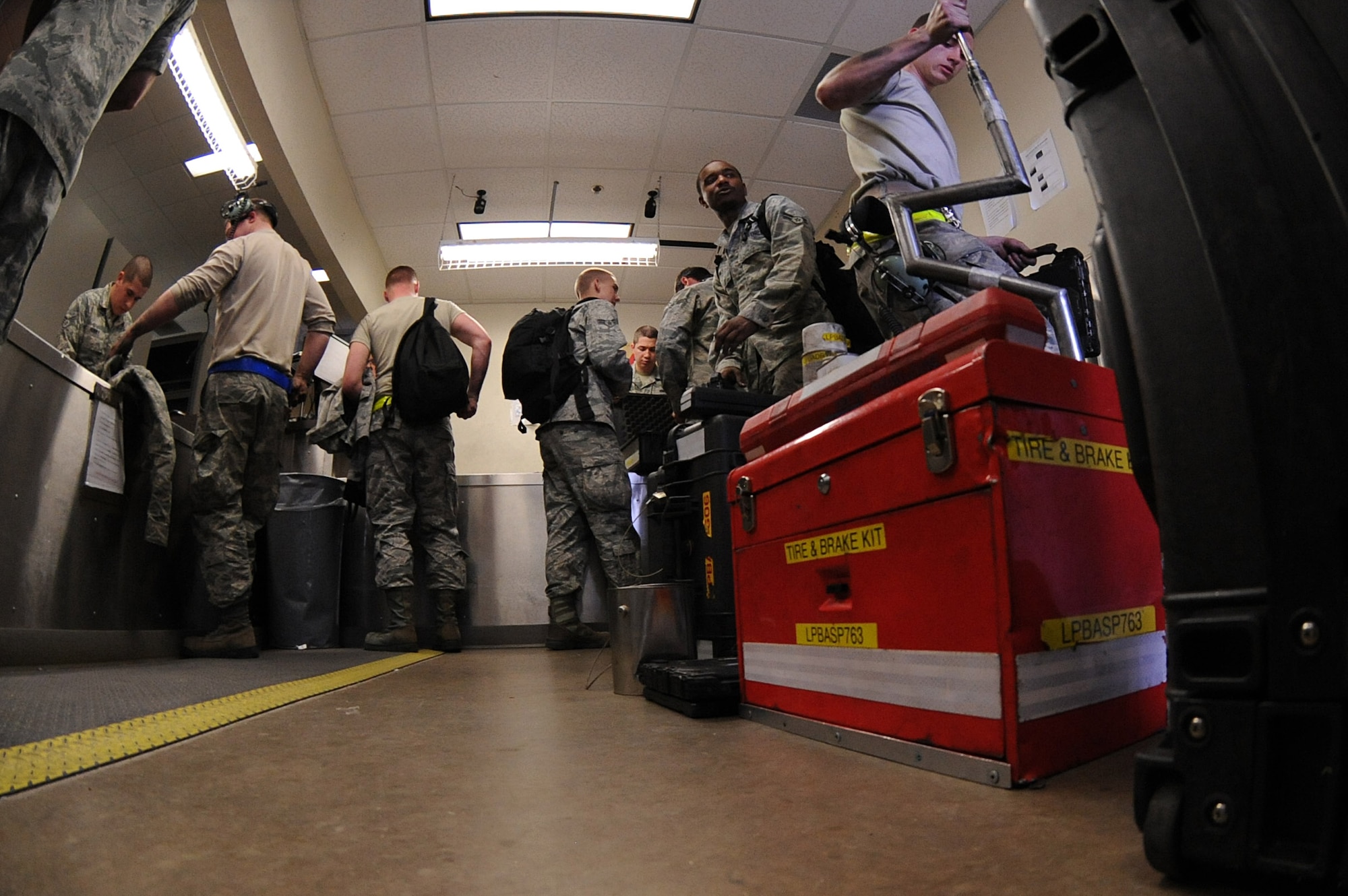 Airmen from multiple career field specialties prepare to turn in equipment to the 314th Consolidated Tool Kit Support Flight, March 21, 2014, at Little Rock Air Force Base, Ark. Every tool signed out from the CTK must be returned in proper working condition before the CTK custodian inventories the equipment. (U.S. Air Force photo by Tech. Sgt. Chad Chisholm)