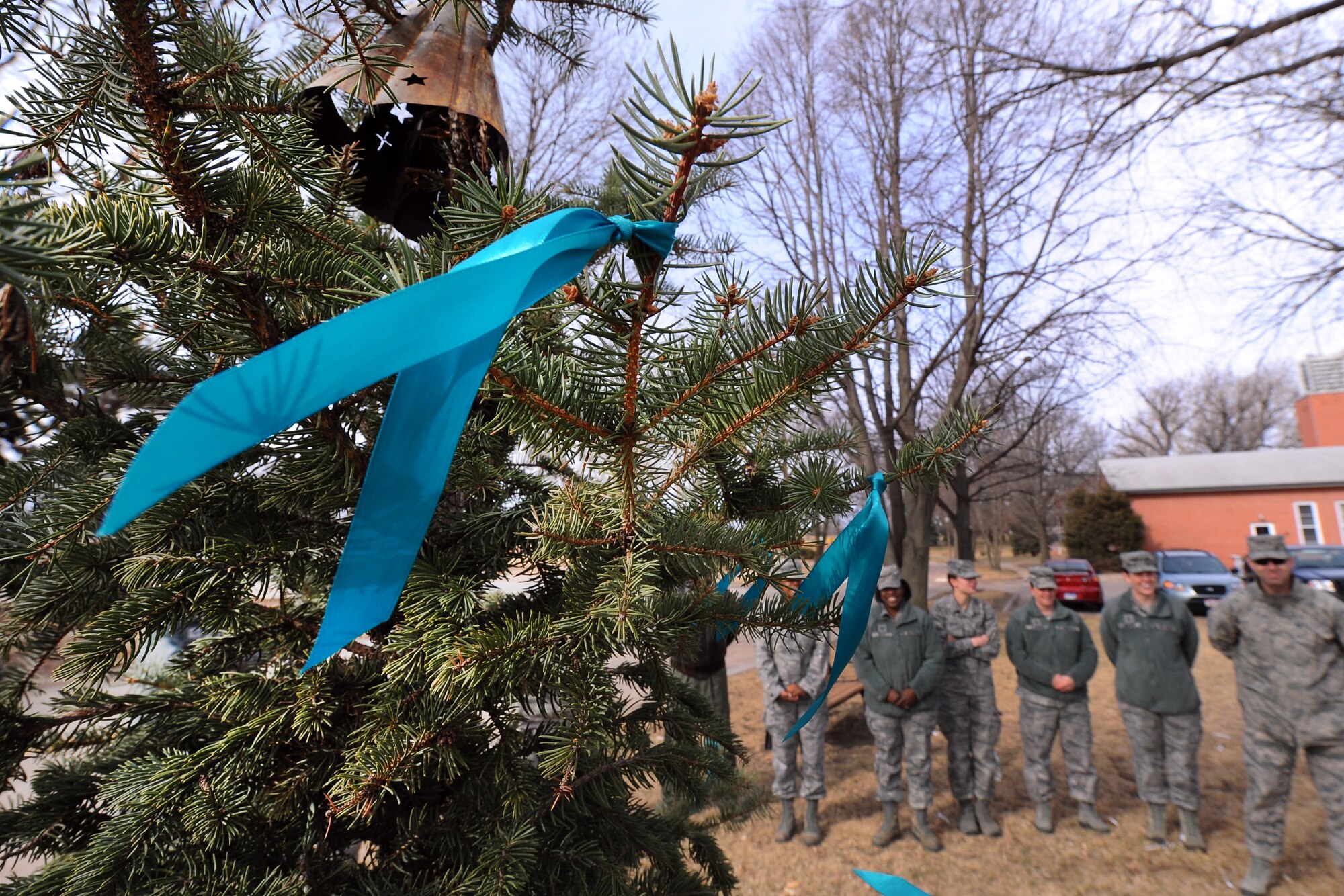 OFFUTT AIR FORCE BASE, Neb. -- Teal ribbons, representing the Sexual Assault Awareness Month, blow gently in the wind following a formal recognition ceremony held at the SAC Chapel on April 1. April is Sexual Assault Awareness Month throughout the Department of Defense and Team Offutt is using this opportunity to highlight the program and build on existing momentum to fight this crime and ensure everyone is treated with dignity and respect.    (U.S. Air Force photo by Josh Plueger/Released)