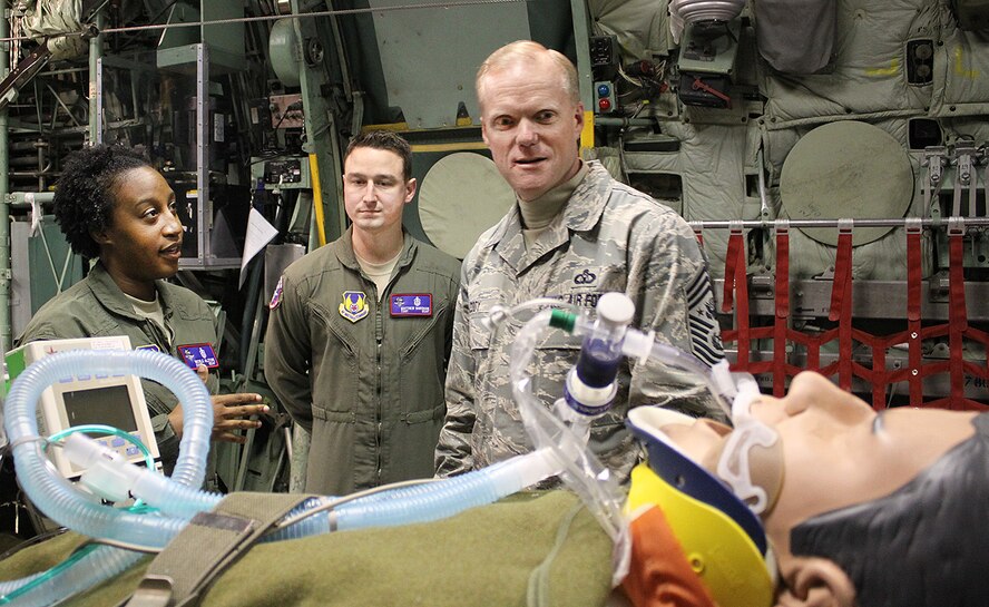 Staff Sgt. Nicole Alston and Tech. Sgt. Matthew Worsham interact with Chief Master Sgt. of the Air Force James Cody during his tour of the U.S. Air Force School of Aerospace Medicine March 21. Cody visited the school during his two-day visit to Wright-Patterson Air Force Base. He also spoke to enlisted members in Airman Leadership School and visited the 88 Operations Support Squadron and the 445 Airlift Wing. (Air Force photo by Tara Dixon Engel)