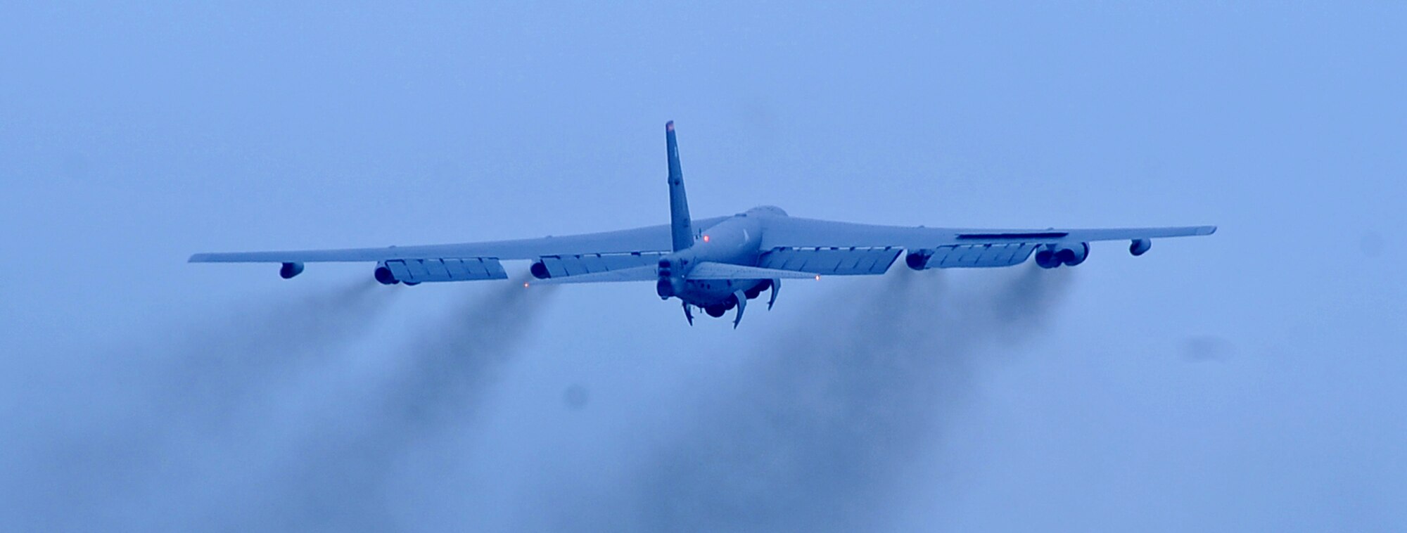 A B-52H Stratofortress raises its landing gear over Barksdale Air Force Base, La., April 2, 2014. Two B-52Hs, assigned to 96th Bomb Squadron, and two B-2 Spirit strategic bombers from Whiteman Air Force Base, Mo., flew non-stop from their respective home stations to conduct range training operations and low approach training flights within the vicinity of Hawaii, April 2, 2014. The training flights of approximately 20 and 21 hours in duration, ensure U.S. strategic bomber forces maintain a high state of readiness and demonstrate U.S. Strategic Command's ability to provide a bomber force that is flexible, credible, and always ready to respond to a variety of threats and situations around the world. (U.S. Air Force photo/Staff Sgt. Jason McCasland)