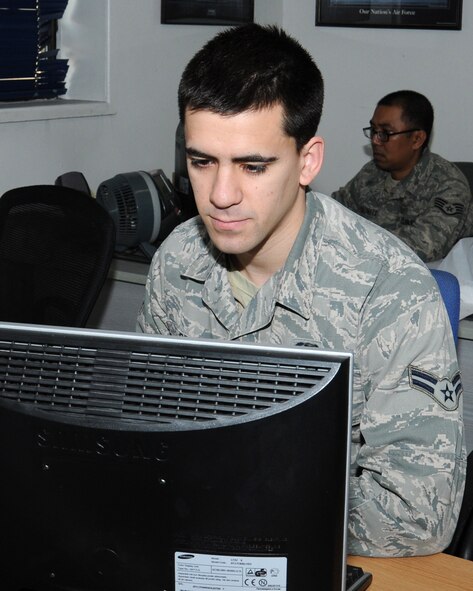 U.S. Air Force Airman 1st Class Sean Gorby, 100th Logistics Readiness Squadron Aircraft Parts Store journeyman from Cedar Springs, Mich., processes a customer request April 1, 2014, on RAF Mildenhall, England. The APS is manned 24/7. It has 27 personnel working to ensure vital parts get to aircraft when required. (U.S. Air Force photo by Gina Randall/Released)