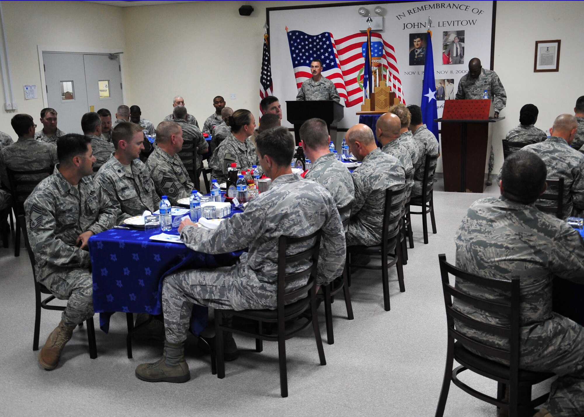 The 380th Air Expeditionary Wing holds a Chief's Induction Ceremony at an undisclosed location in Southwest Asia, March 29, 2014. (U.S. Air Force photo by Staff Sgt. Michael Means/Released)