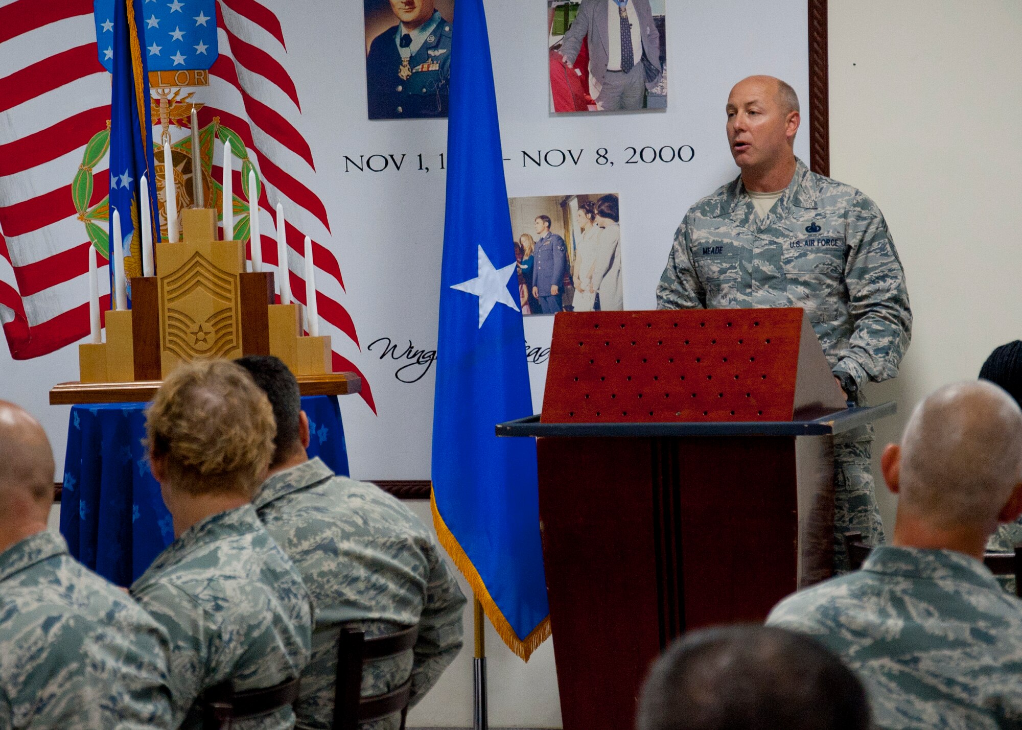 Chief Master Sgt. Garth Meade, 380th Air Expeditionary Wing command chief, speaks during the Chief's Induction Ceremony at an undisclosed location in Southwest Asia, March 29, 2014. (U.S. Air Force photo by Staff Sgt. Michael Means/Released)