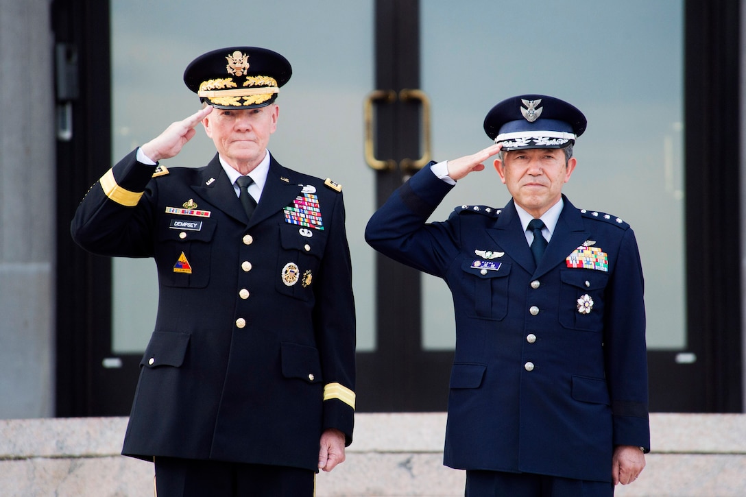 U.S. Army Gen. Martin E. Dempsey, left, chairman of the Joint Chiefs of ...