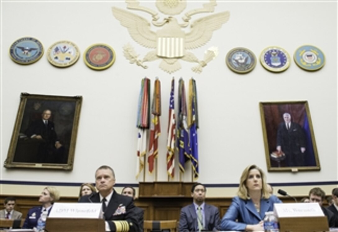 Navy Adm. James A. Winnefeld Jr., vice chairman of the Joint Chiefs of Staff, and Christine E. Wormuth, deputy undersecretary of defense for strategy, plans and force development, testify before the House Armed Services Committee on the 2014 Quadrennial Defense Review in Washington, D.C., April 3, 2014.
