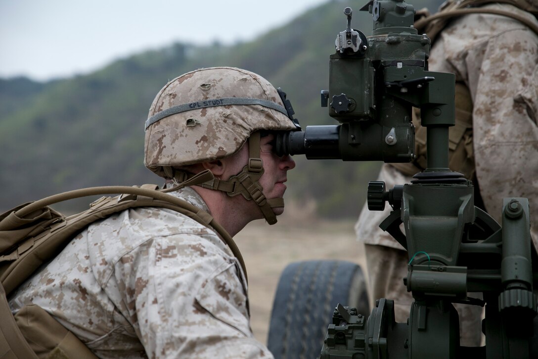 Cpl. Chase Studt checks the calibration of a M777A2 lightweight 155 mm howitzer during a live-fire training April 3 at Su Seung-ri Range in the Republic of Korea as part of Exercise Ssang Yong 2014. Ssang Yong is an exercise that showcases the amphibious and expeditionary capabilities of the ROK and U.S. forces as well as the maturity of the relationship between the two nations. Studt, a native of Cedar Rapids, Iowa, is a field artillery cannoneer with Golf Battery, 2nd Battalion, 11th Marine Regiment currently assigned to Battalion Landing Team 2nd Bn., 5th Marines, 31st Marine Expeditionary Unit, III Marine Expeditionary Force. (U.S. Marine Corps photo by Cpl. Lena Wakayama/Released)