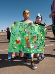 HOLLOMAN AIR FORCE BASE, N.M. – Four-year-old Tony Jones and three-year-old John Siebert, students at Holloman's Child Development Center, hold up a banner during a march to commemorate the start of the 2012 Month of the Military Child April 6.