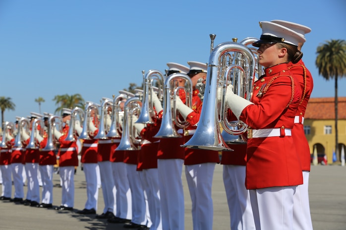 The U.S. Marine Drum & Bugle Corps present their instruments at the conclusion of their performance during the Battle Color Ceremony on Shepherd’s Field aboard the depot, March 15.