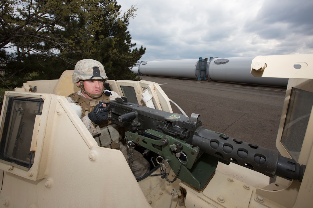 U.S. Marine Corps Lance Cpl. Anthony Pallegrini, military policeman with Charlie Company, 3D Law Enforcement Battalion, provides port security during Ssang Yong 14 at Pier 9, Pohang, South Korea, April 4, 2014. Exercise Ssang Yong is conducted annually in the Republic of Korea to enhance interoperability between U.S. and ROK forces by performing a full spectrum of amphibious operations while showcasing sea-based power projection in the Pacific. (U.S. Marine Corps Photo by Cpl. Sara A. Medina, III MEF Combat Camera/Released)