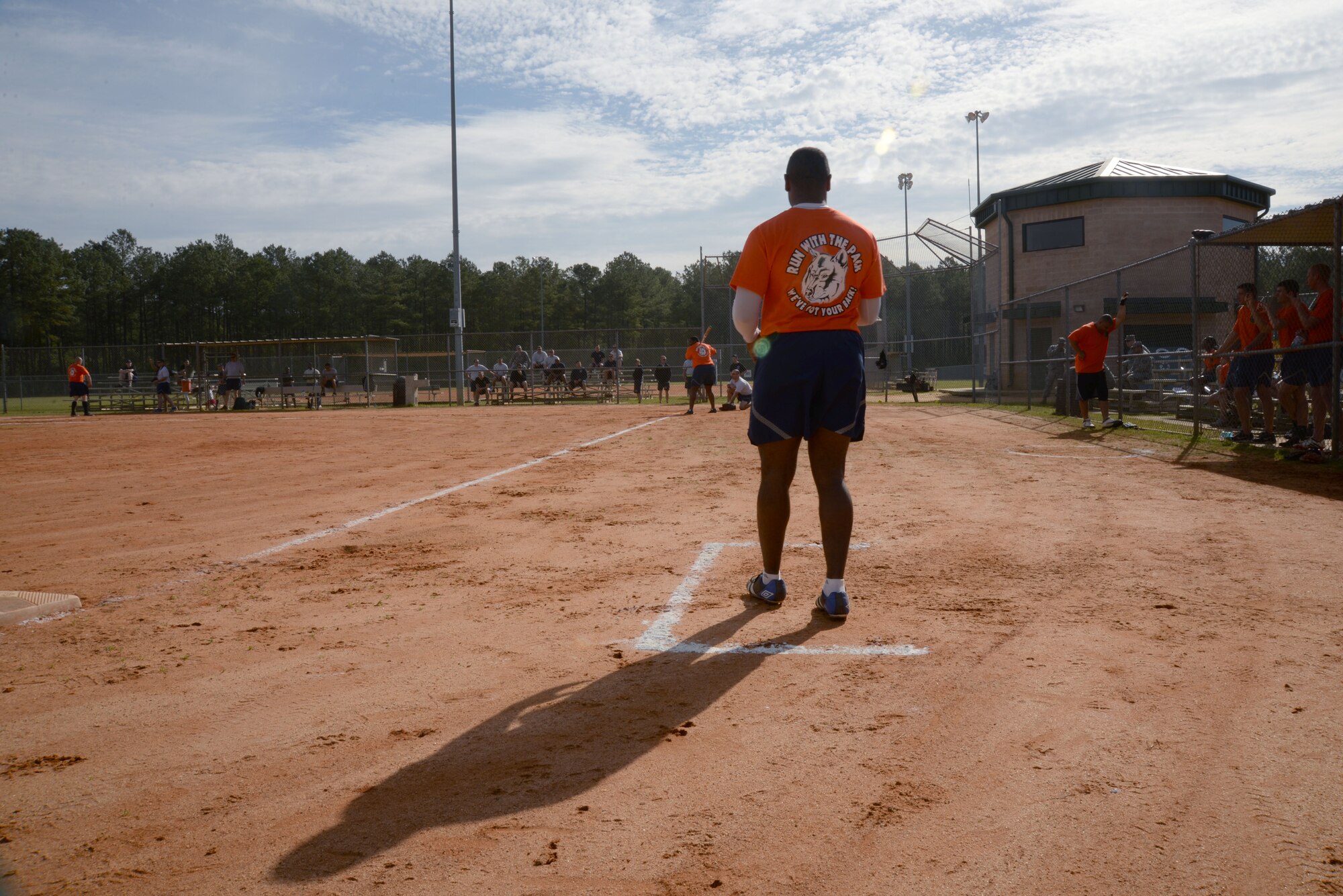 U.S. Air Force 1st Lt. Pherris Ashby, 20th Logistics Readiness Squadron vehicle maintenance flight commander, coaches his Airmen from third base during a 20th Mission Support Group Warrior Challenge softball game, Shaw Air Force Base, S.C., April 4, 2014. Eight teams competed in the 20th MSG Warrior Challenge softball tournament along with other events to help boost squadron morale and build comraderie. (U.S. Air Force photo by Airmen 1st Class Michael A. Cossaboom/Released)